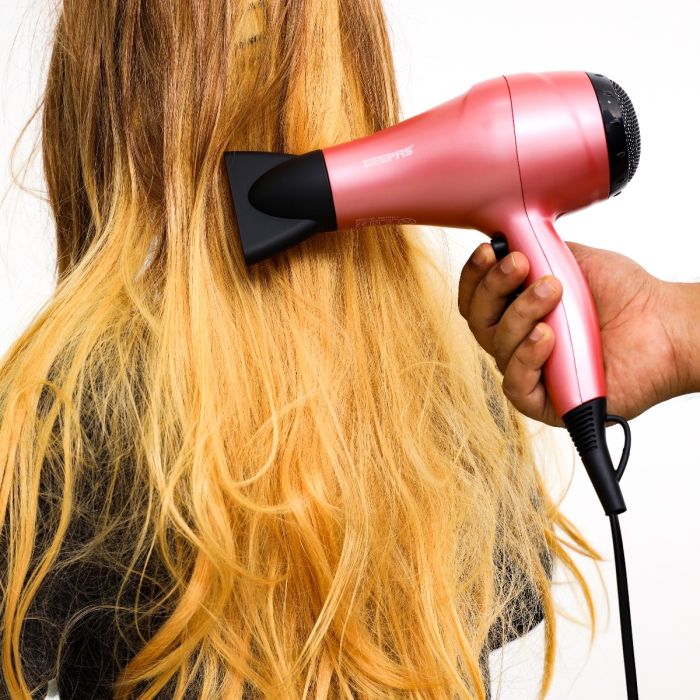 Geepas GHF86054 4-in-1 Hair Dryer, 2-in-1 Hair Straightener & Curler with Round Brush & EVA Carry Bag | 2000W | Ceramic Coating Plates| PTC Heater| 360° Swivel Cord - Image 3