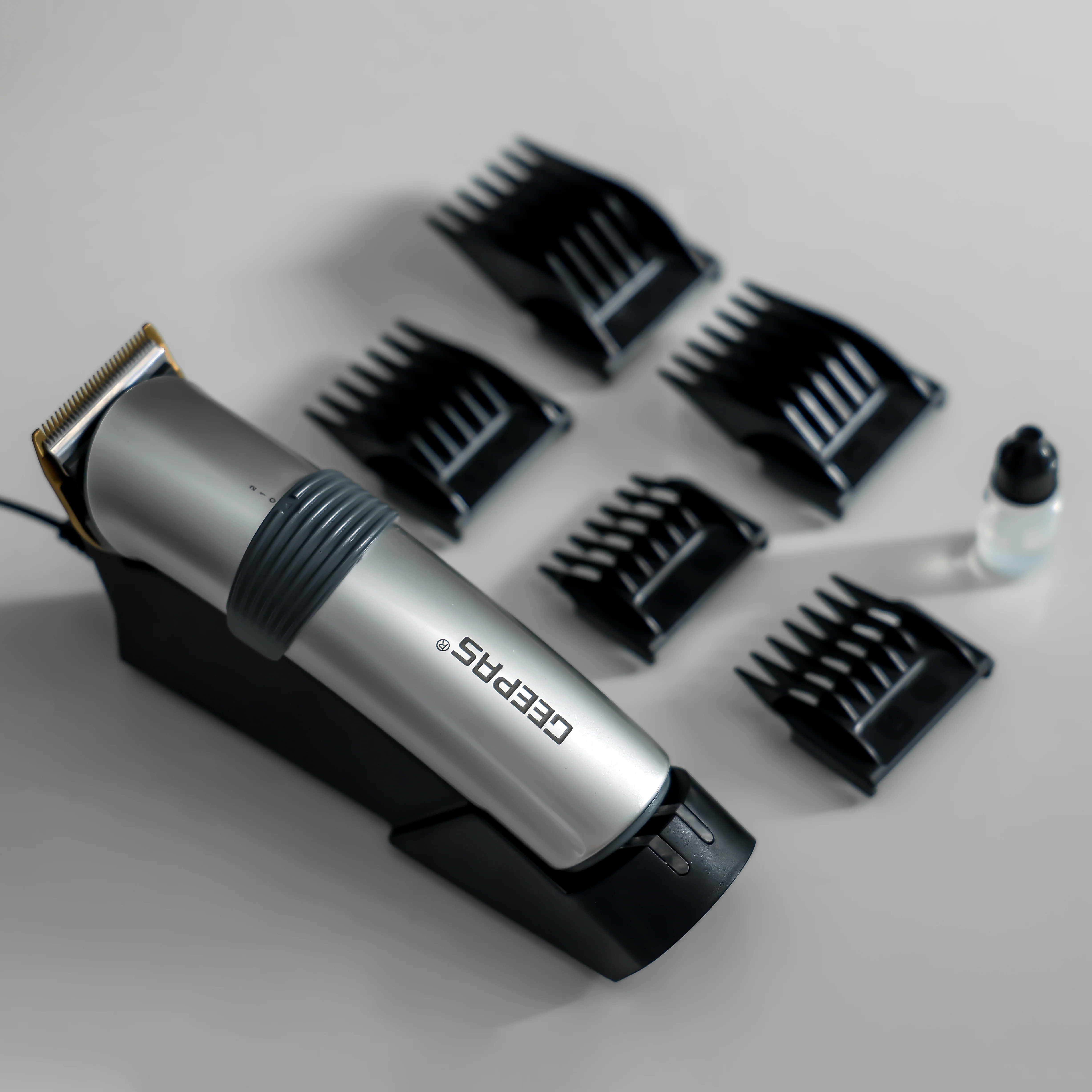Geepas GTR8684 Professional Hair Clipper | Cordless & Rechargeable Trimmer with Stainless Steel Blade |Adjustable Razor | 5 Combs | Brush, Oil & 8-Hour Charging - Image 2