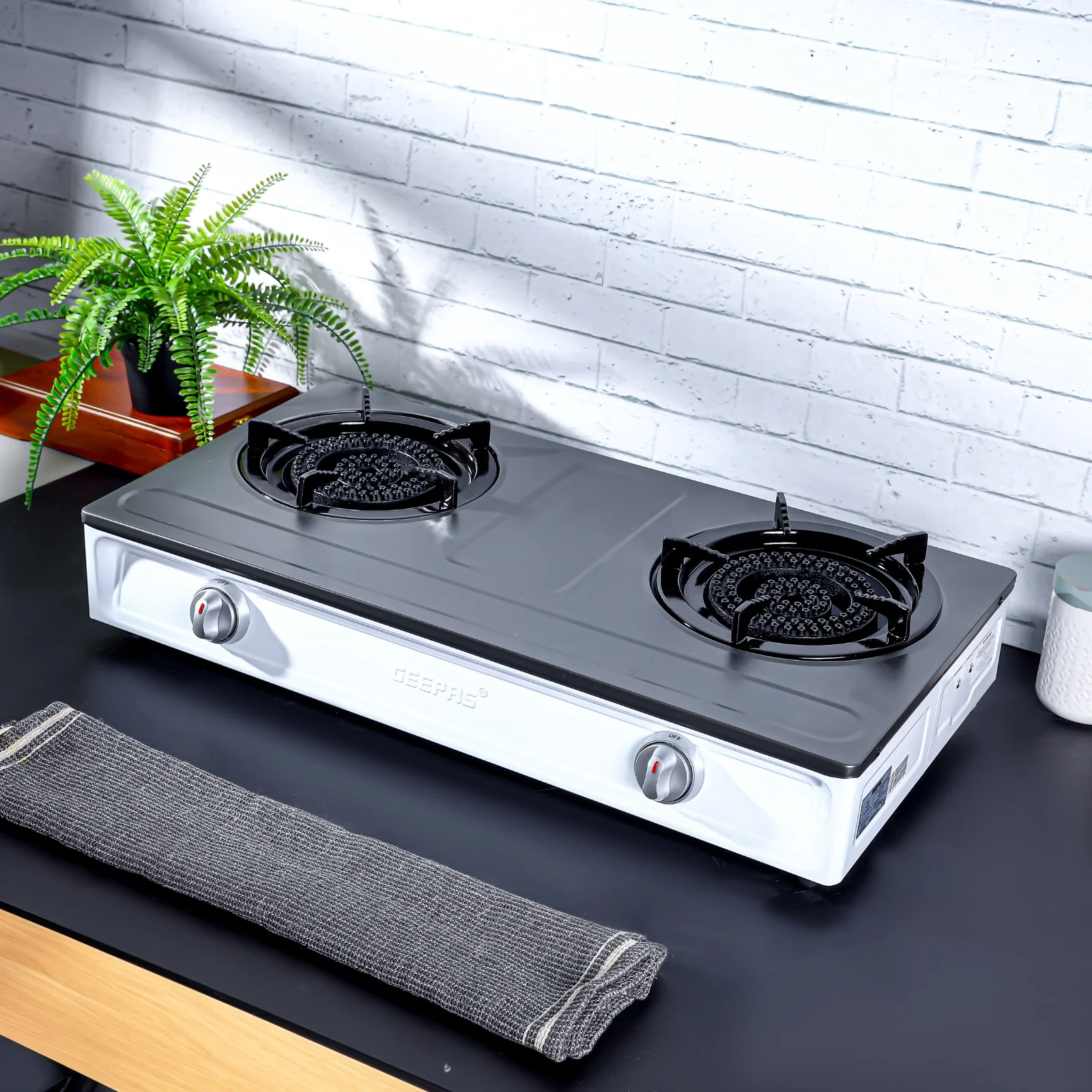 Geepas GGC31048 Stainless Steel Gas Cooker | 2 cast iron burners| auto ignition| low gas use saves 60%| heavy enamel pan support| durable| easy to clean| 2-year warranty - Image 3